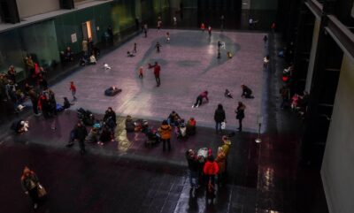 visitors-in-the-turbine-hall-interact-with-the-tania-bruguera-installation-at-tate-modern-london-2018-R8W4GY-transformed